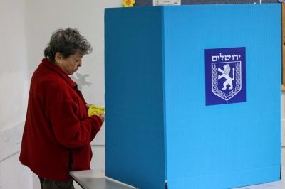 Israelis vote for municipal councils in test of public mood