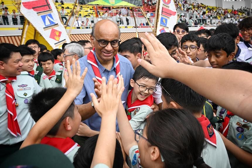 President Tharman welcomed as Chief Scout with record-setting human formation of scout emblem