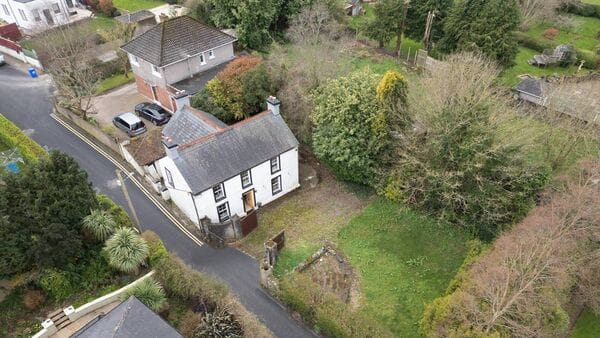 Great farmhouse revival or knock and rebuild at €600,000 Model Farm Road home