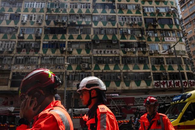 A fire in large Hong Kong residential building kills at least 5 people and injures 36