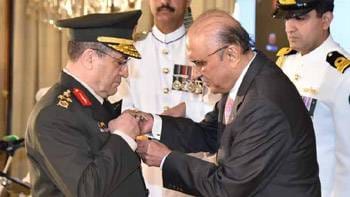 President confers Nishan-i-Imitaz (M) upon Turkish General