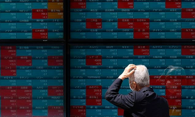 Stock market today: Asian markets wobble after Fed sticks with...