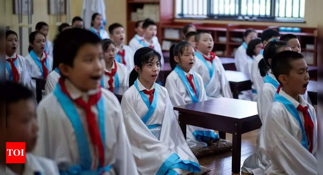 China launches campaign to halt school bullying, excessive homework and boost student's mental health - Times of India