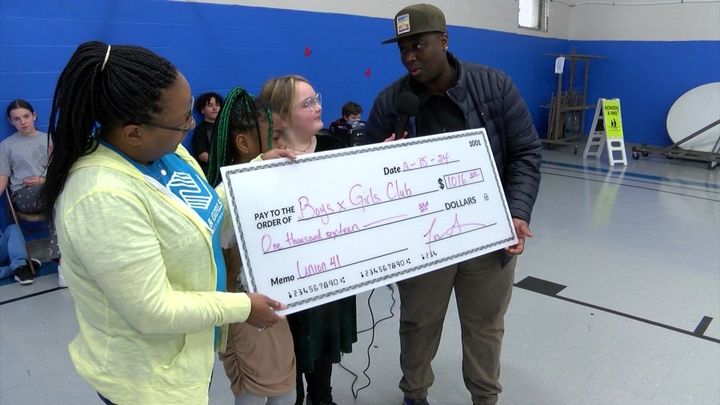 Union 41 owner Chef T presents check to local Boys and Girls Club