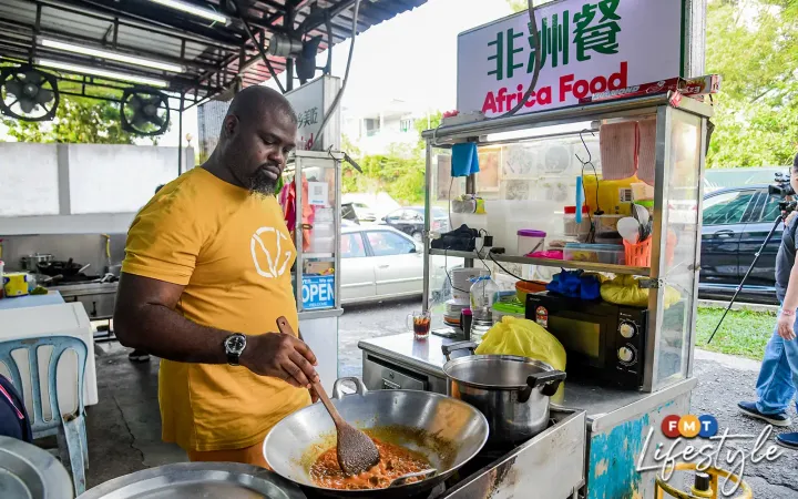 Nigerian refugee hopes locals will give his food a try