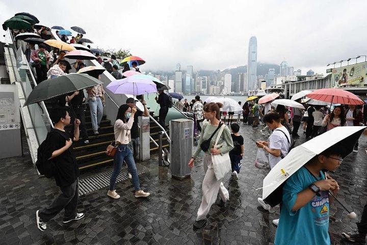 Hong Kong issues first red storm signal of year as roads flood