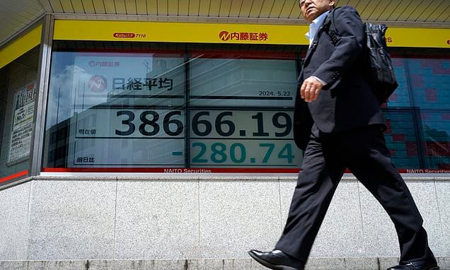 Stock market today: Asian shares edge lower after Wall Street sets...