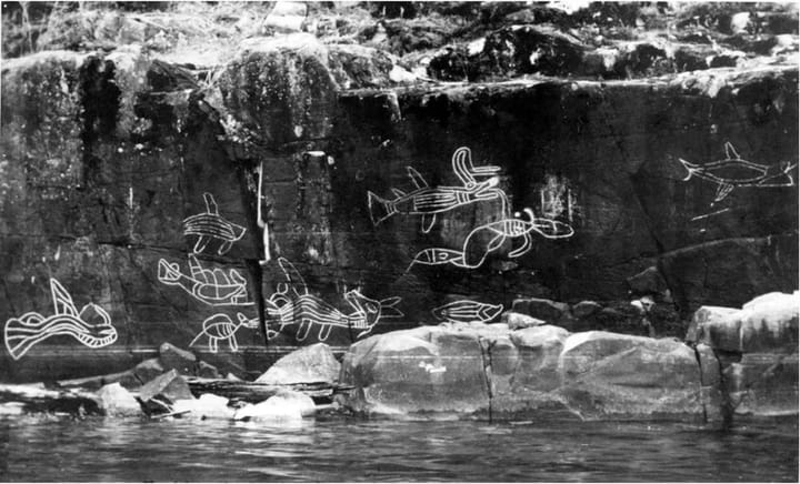 Ḥaa'yuups shares his knowledge of petroglyphs and ceremonial curtains on June 20